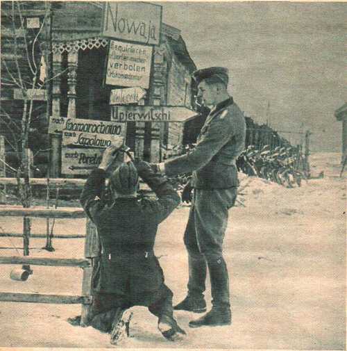 German soldiers making roadsign