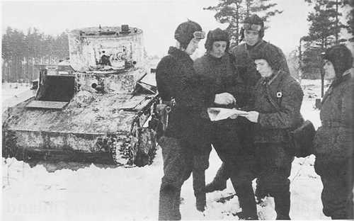 Tank crew receiving briefing