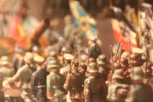 Vintage German toy soldiers on the march.