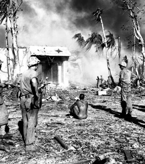 Marines guard naked Japanese soldier