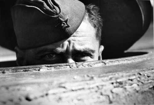 Tank gunner looks