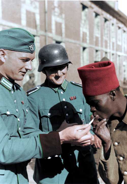 Ordnungspolizei and French Colonial POW (col.)