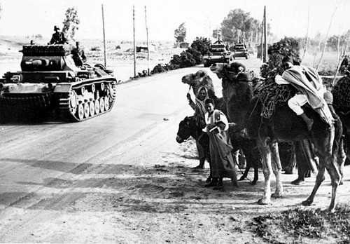 Tanks roll by