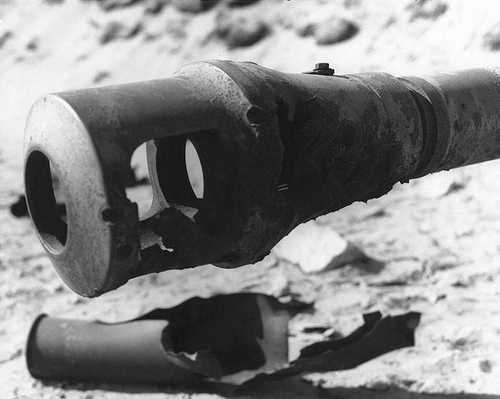 Damaged muzzle brake.