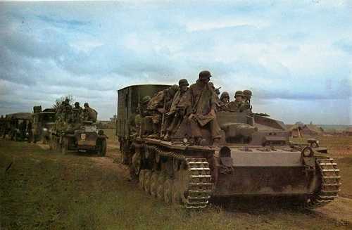 German Stug III with mounted infantry