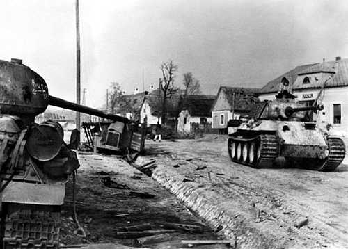 Panther tank on a village street