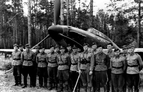 Pilots with a Hurricane aircraft