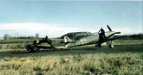 Bf-109 towed by tankette