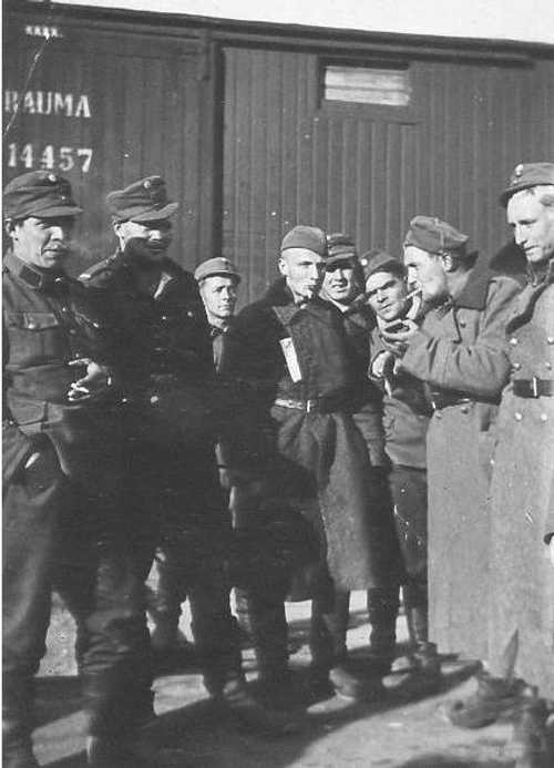 A smoke break outside their train
