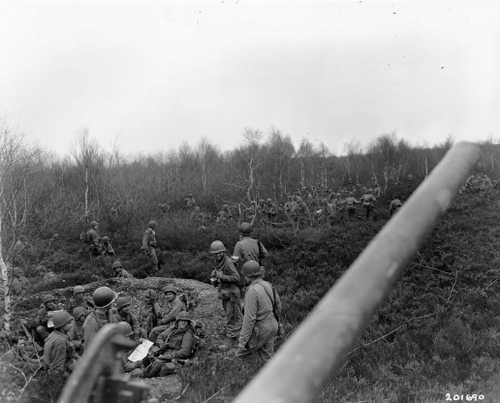 Rest amid brush and foxholes