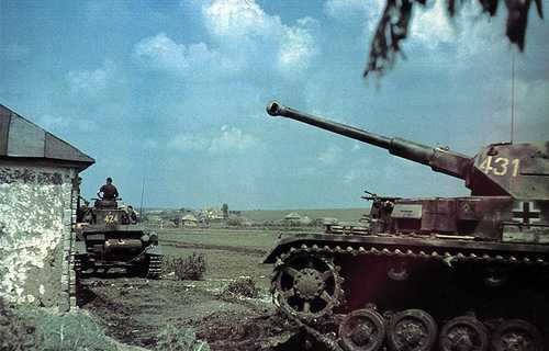 Panzer III towing panzer IV.