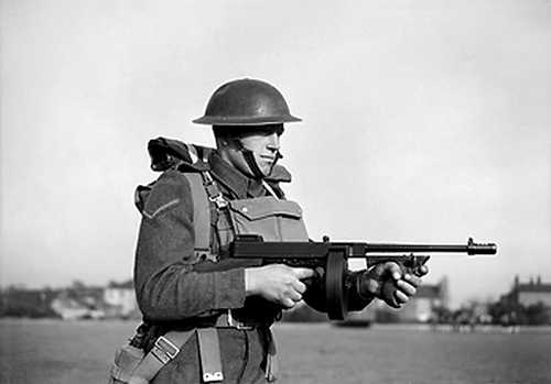 British Soldier holding a Tommy Gun