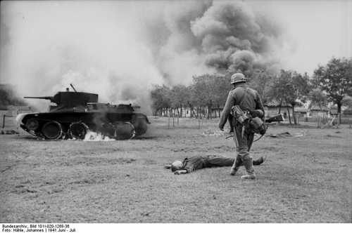 German soldier inspecting destruction.