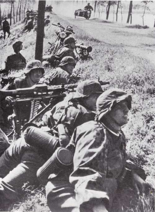 Waffen SS await Stuka air support Holland 1940