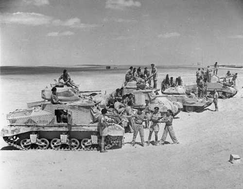 Cleaning the guns - South African armor.