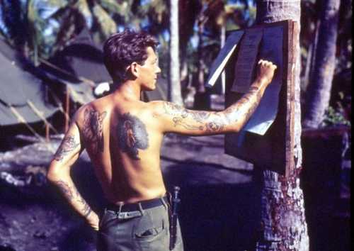 Heavily tattooed Marine