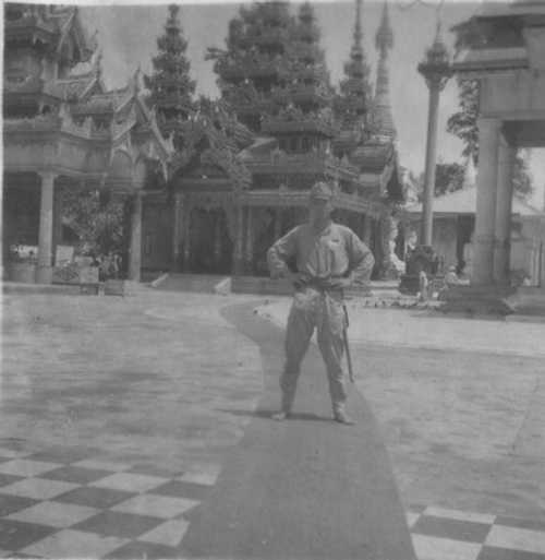 Japanese soldier posing for victory picture