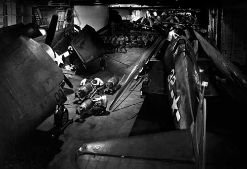 Ordnancemen Work in Hangar Deck