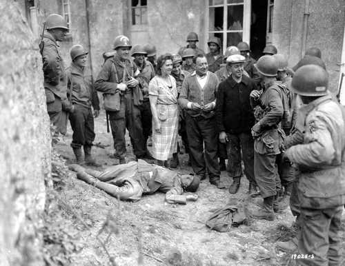 Locals and a Dead German
