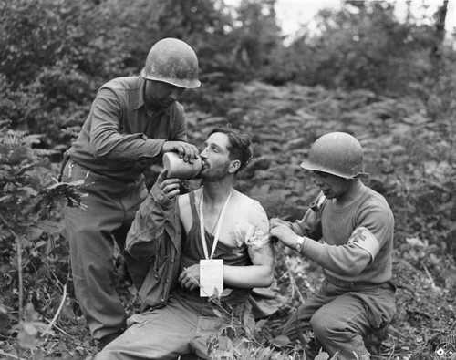 Medics treat a light wound