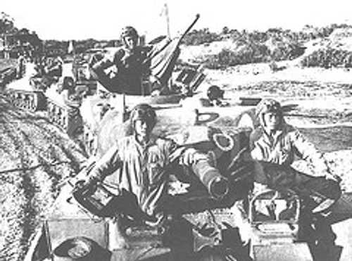 NRA soldiers on M4A4 tanks