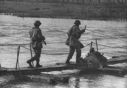 Crossing the pontoon footbridge