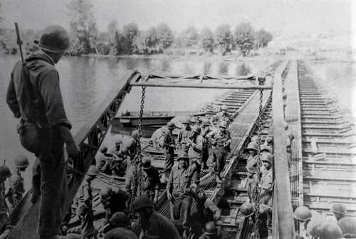 Pontoon bridge being built