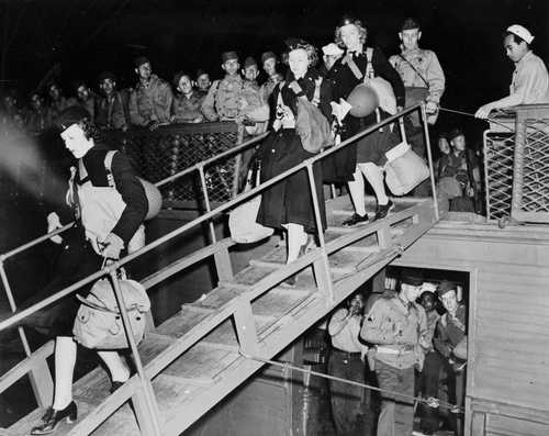 US Army Nurses unload