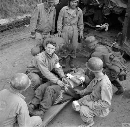 Treating a wounded soldier