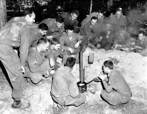 Soldiers cooking breakfast