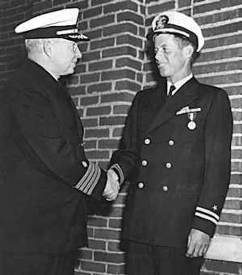 JFK_being_awarded_the_Navy_Marine_Corps_Medal