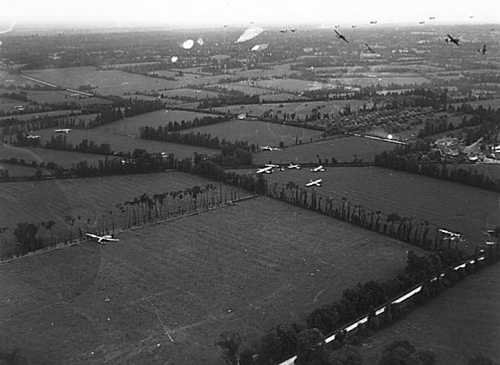 C 47 and Waco over Ste Mere l'Eglise sector DDay