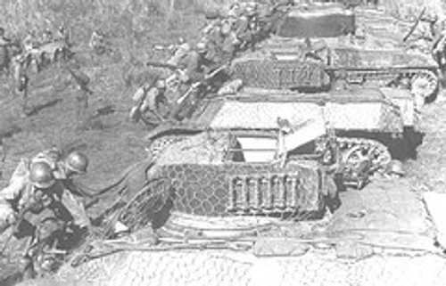NRA soldiers boarding M3A3 tanks