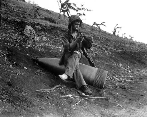 Marine Sits on Navy Shell