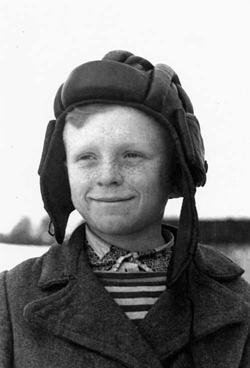 Russian boy and tank helmet