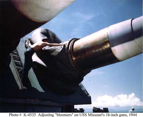 Adjusting &quot;bloomers&quot; on USS Missouri's 16-inch guns