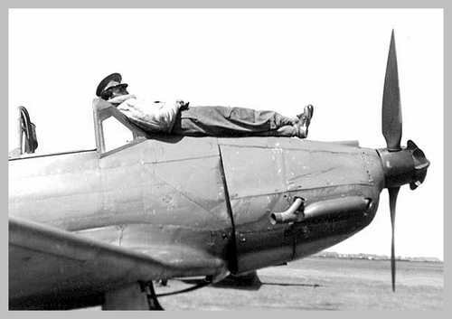 Pilot Resting on Arado-96 Trainer