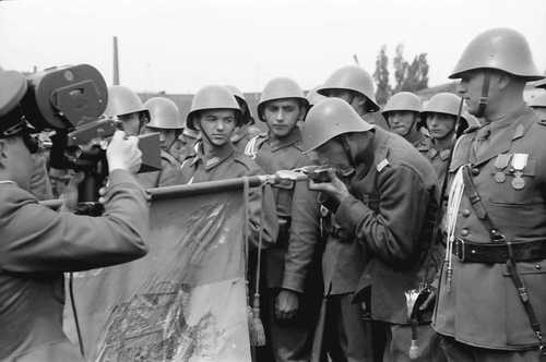 Kissing Romanian flag.