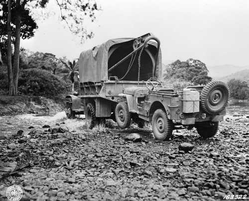 Truck pulling jeep