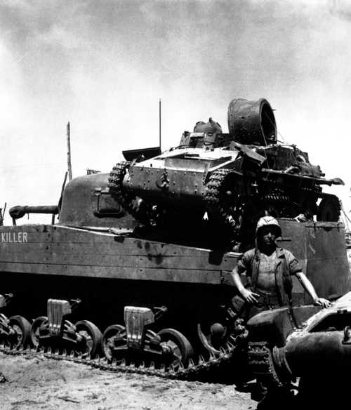 Destroyed Japanese Tank on American Tank