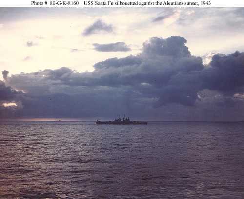 USS Santa Fe Silhouetted against the Aleutians sunset