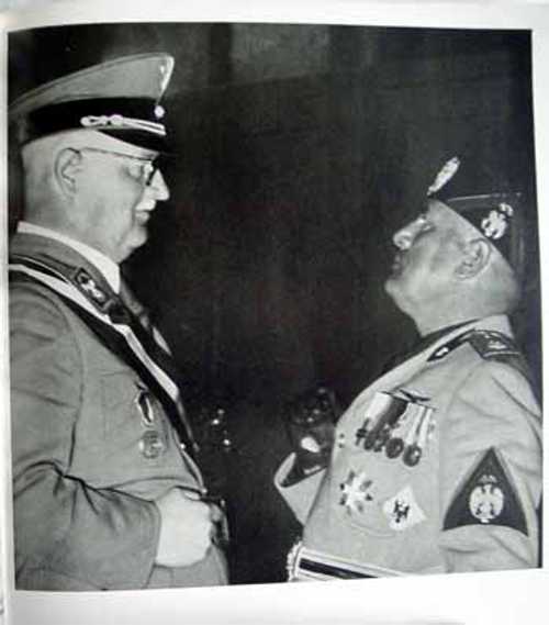 Mussolini meets money man.