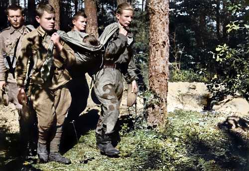 The scouts carry their slain commander. 1943