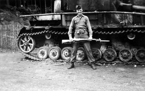 pose with tank