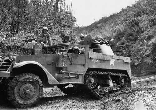 Half-tracked gun motor carriage