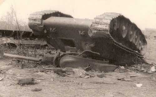 Knocked-out T-34 turned over