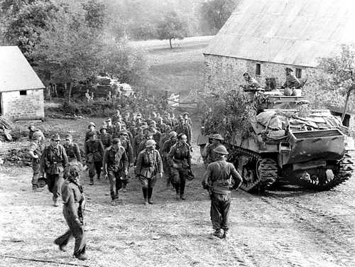 POWs passing by their captors