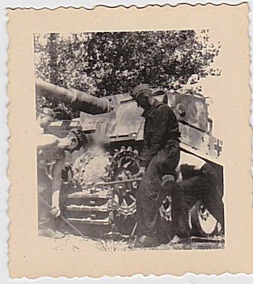 Germans repairing tank
