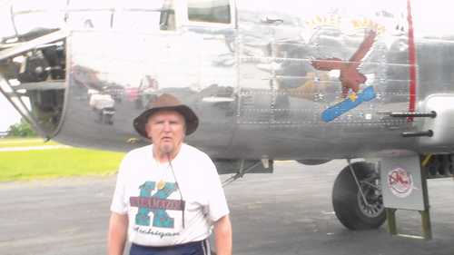 Arnold Mackey stands by the Ellen E and Son B 25D