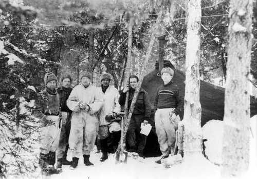 Finns infront of their tent